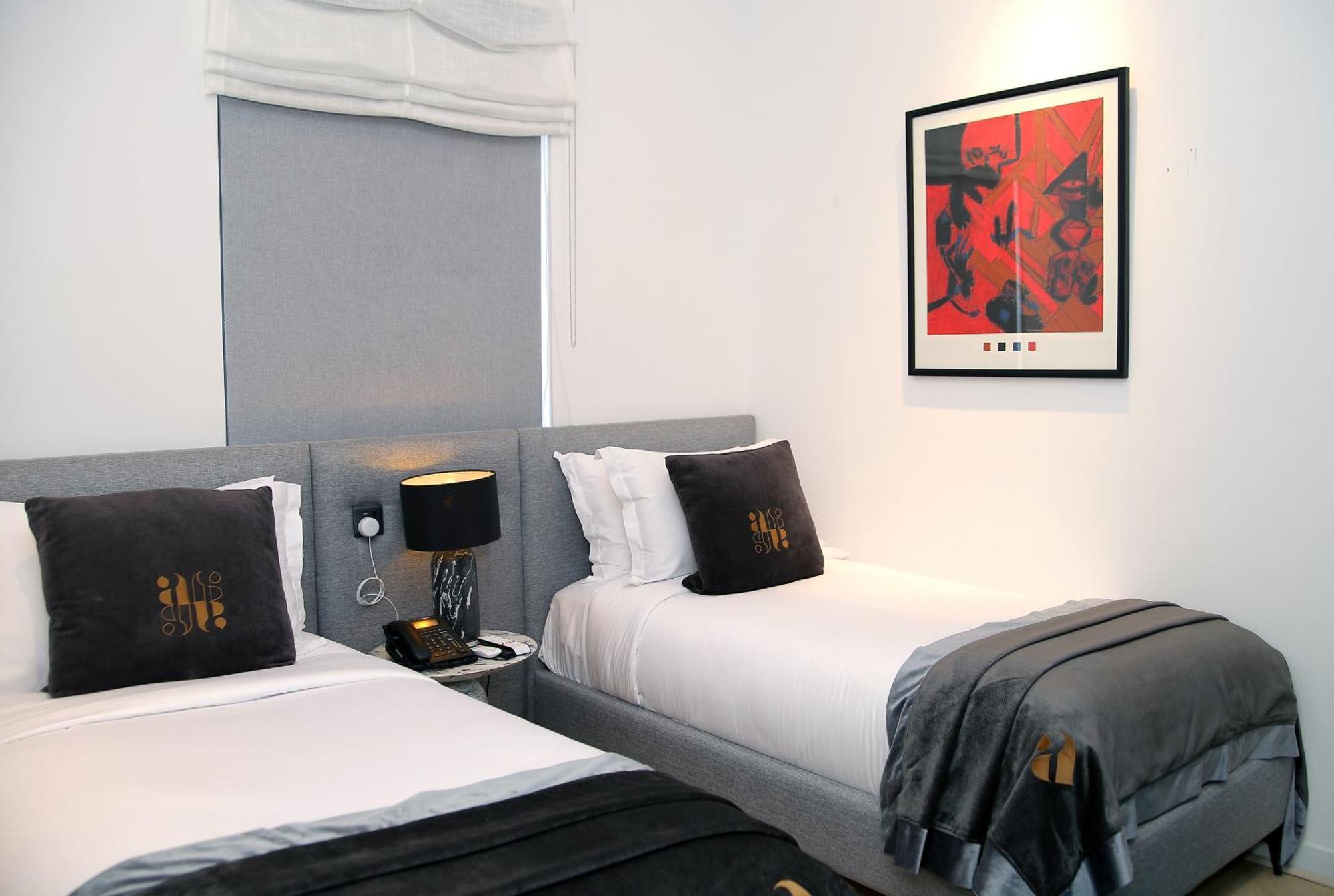 Ambiance Boutique Art Hotel Λαχόρη Δωμάτιο φωτογραφία A bedroom at the hotel